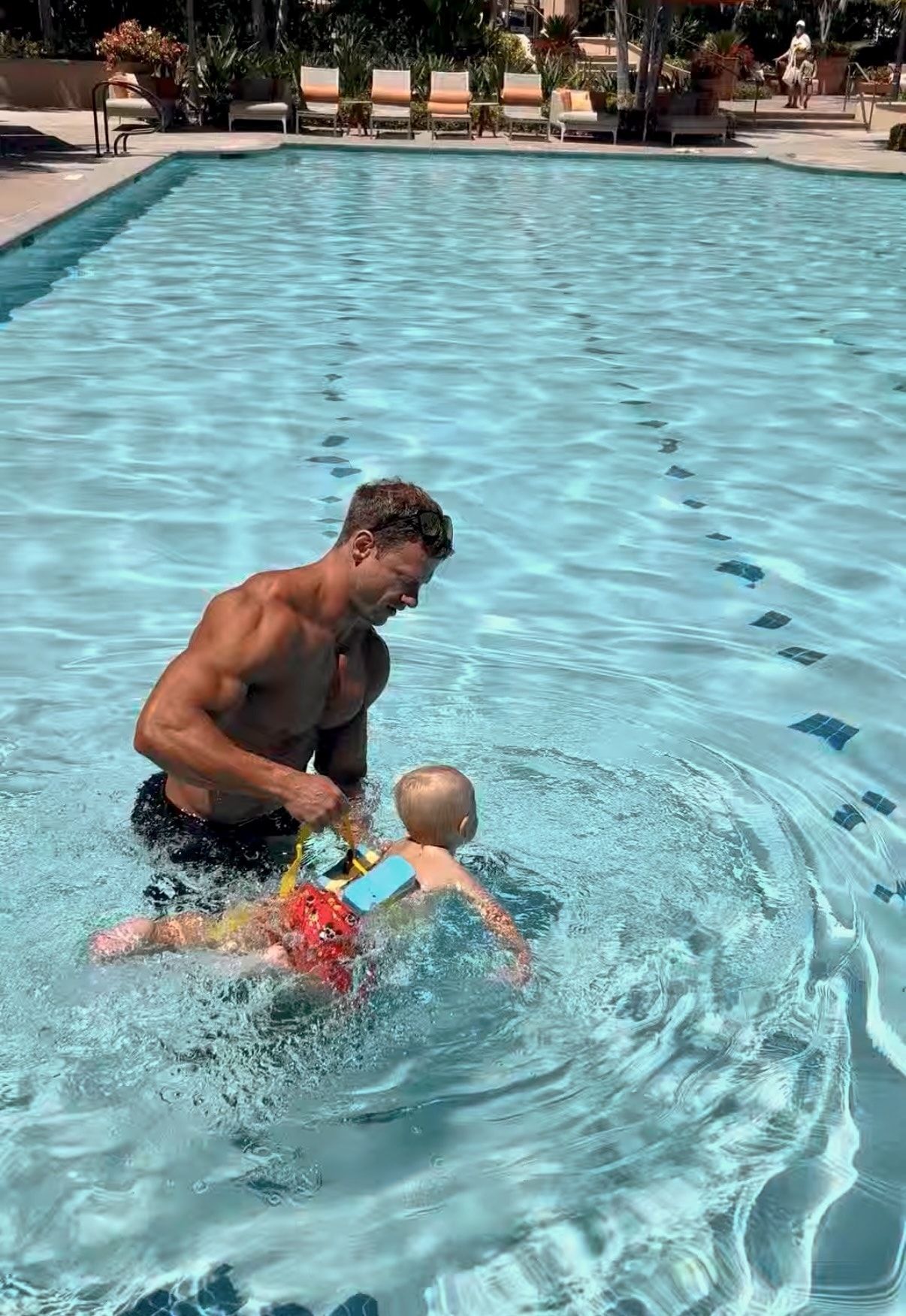 Kids Swim OC coach teaching a child in the pool